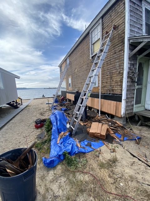 A cedar shake roof and siding job on Long Island