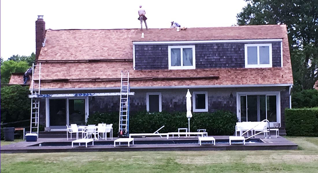 A cedar shake roof and siding job on Long Island