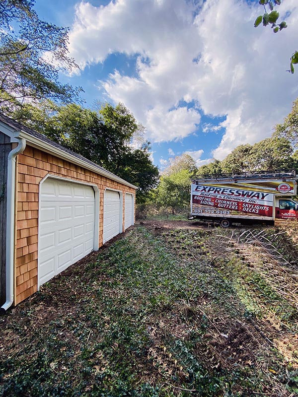 A cedar shake roof and siding job on Long Island