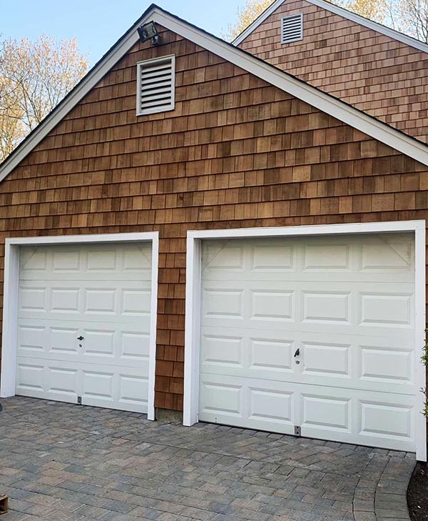 A cedar shake roof and siding job on Long Island